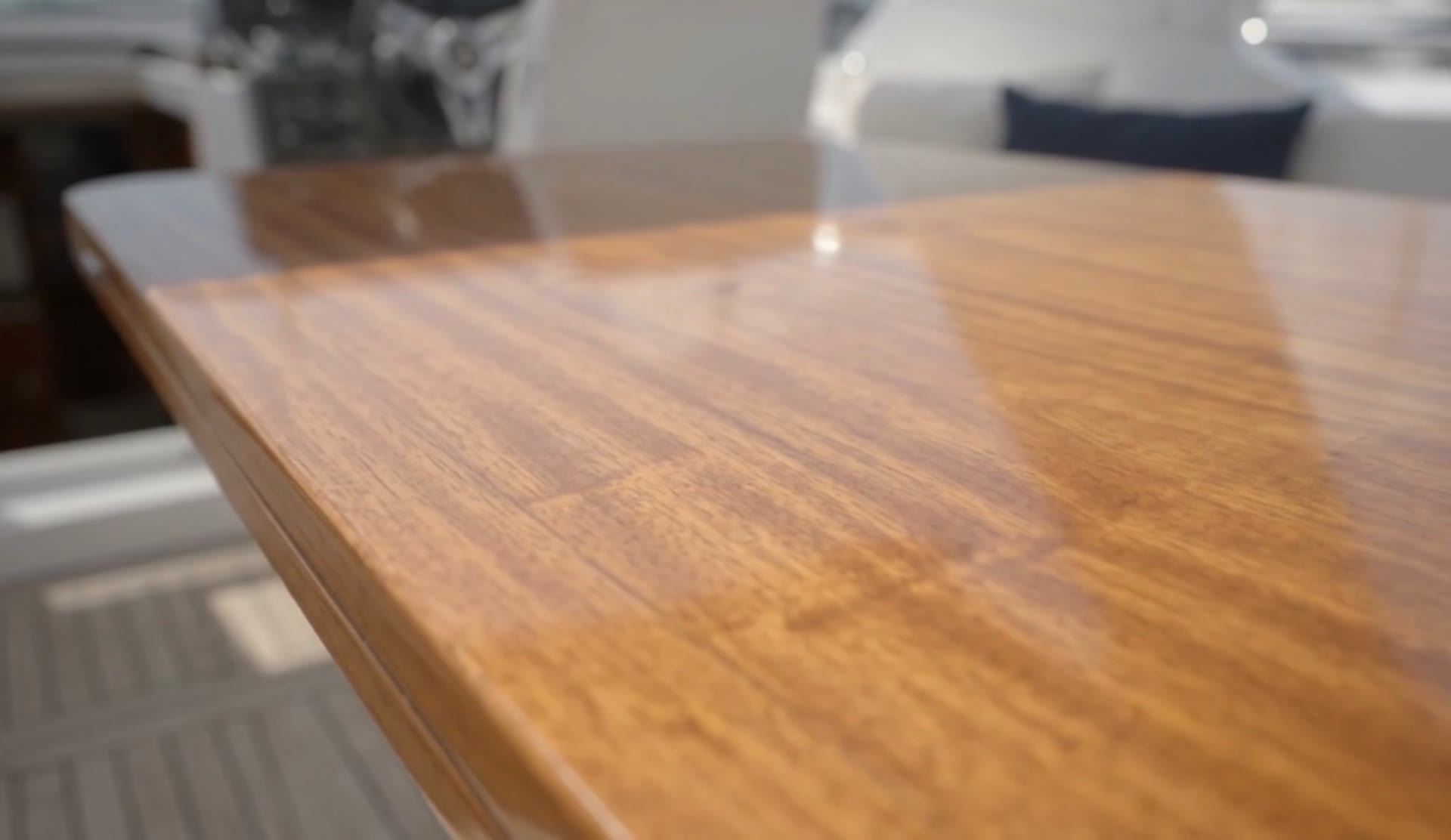 Close detail of wood grain under a high-gloss clear finish