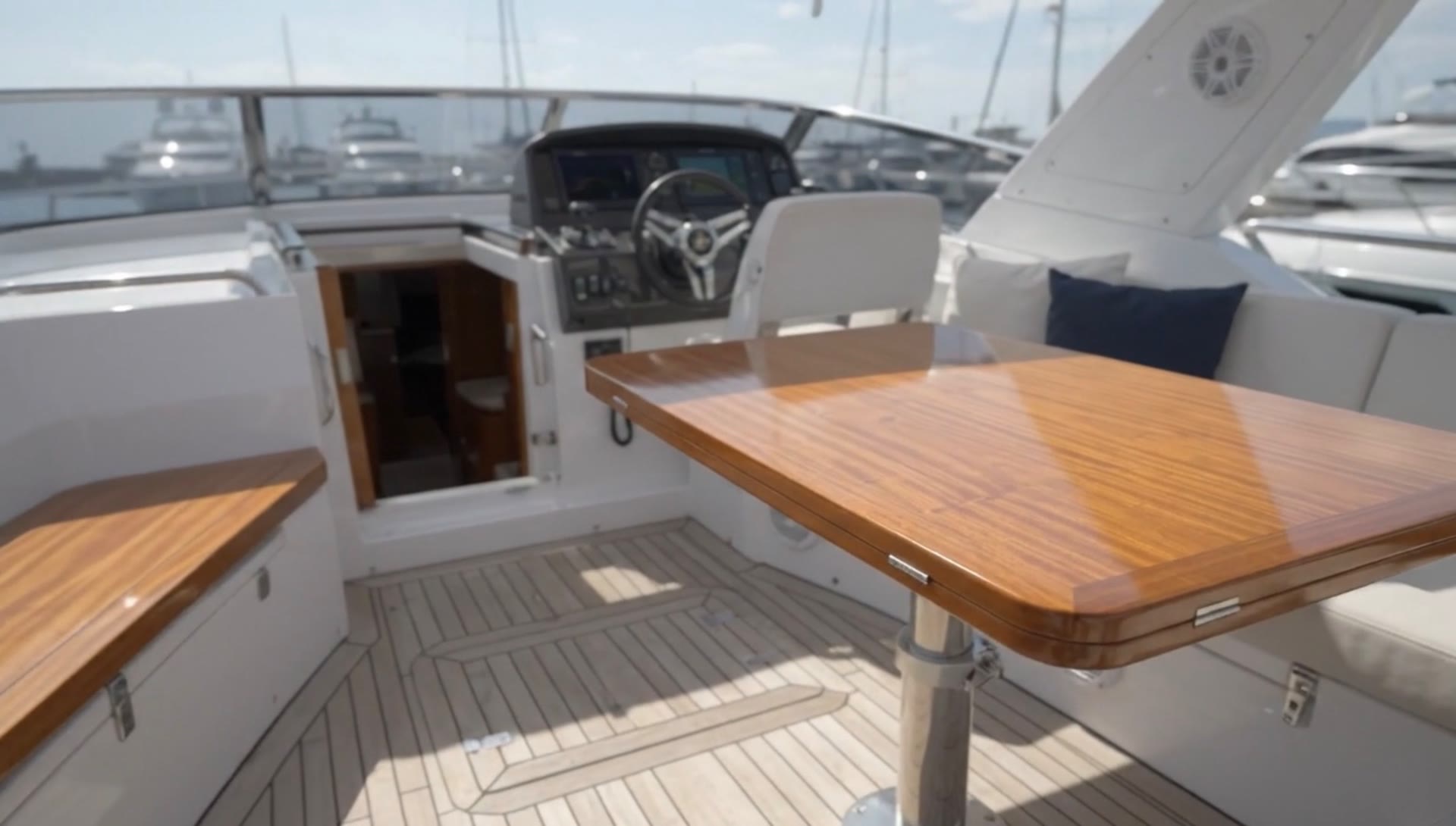 Wide view of high-gloss wood finishing aboard a yacht